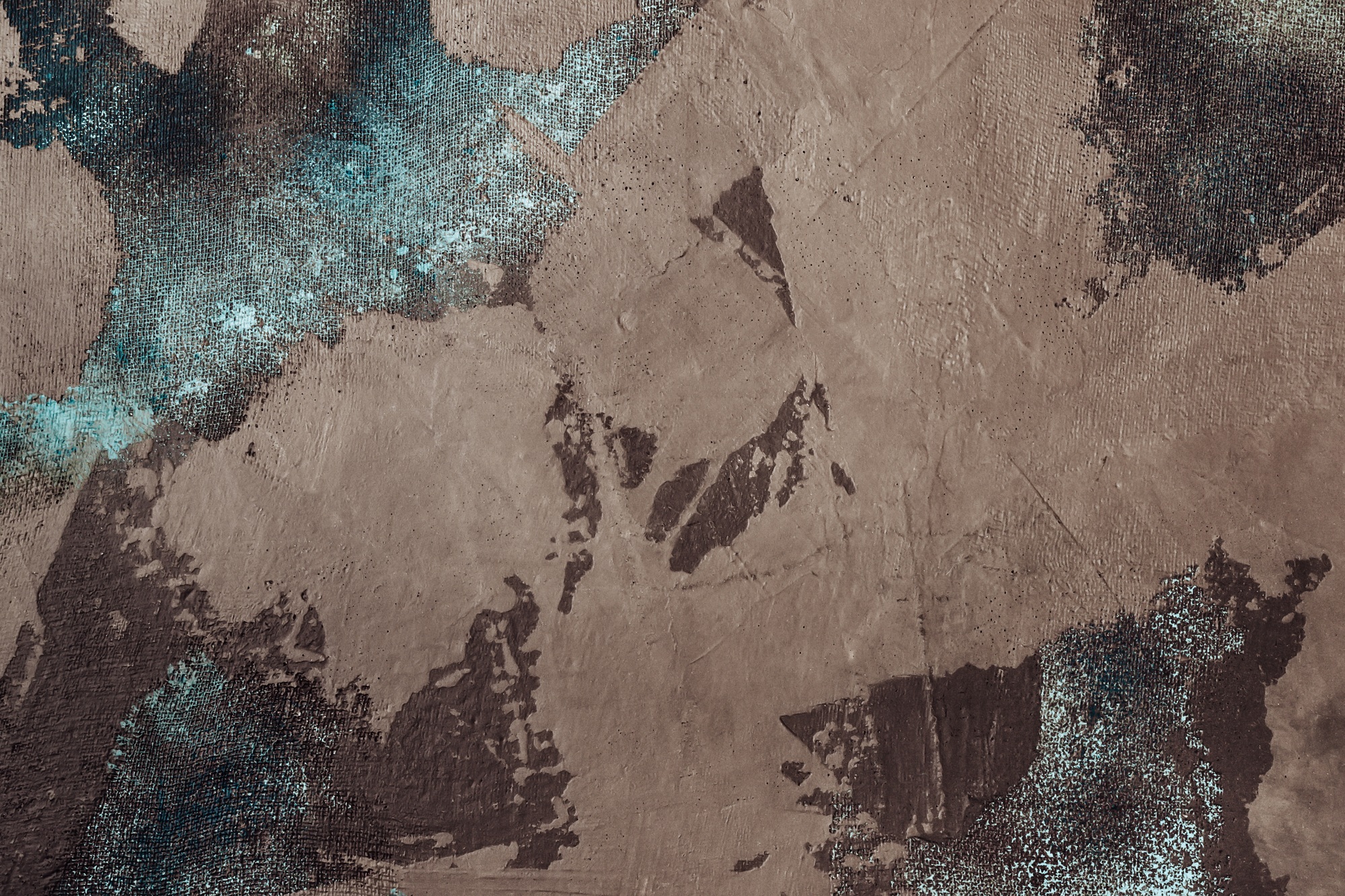 Brown decorative stucco with blue fabric mesh. Aged atmospheric texture or background
